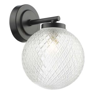Wayne 1 lamp bathroom wall light in matt black with textured glass shade on white background lit